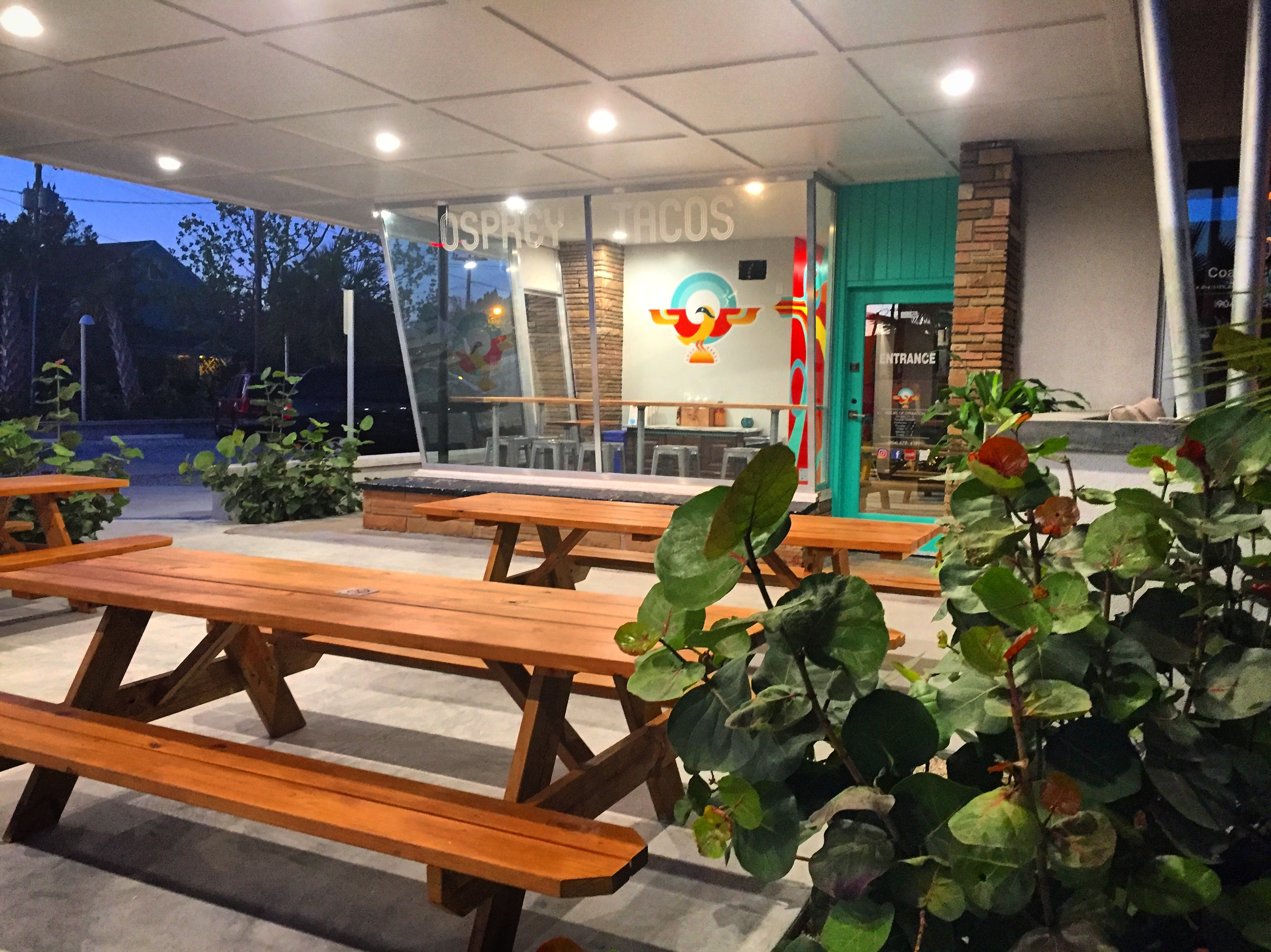 Outdoor seating in front of Osprey Tacos on Anastasia Island in St. Augustine, Florida