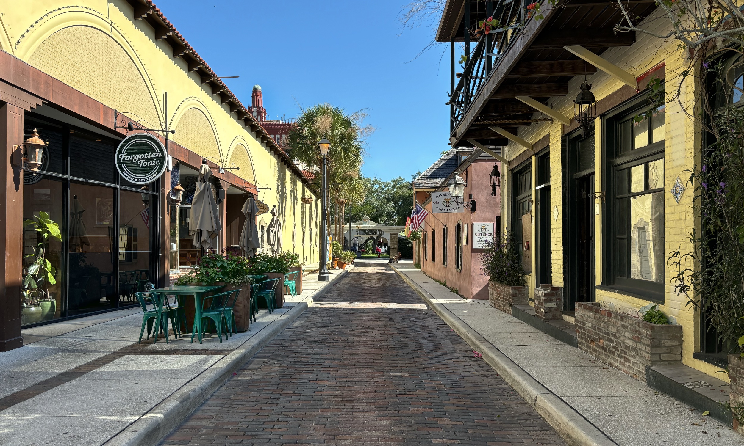 Aviles Street in St. Augustine, looking toward the entrance arch, past restaurants and shops