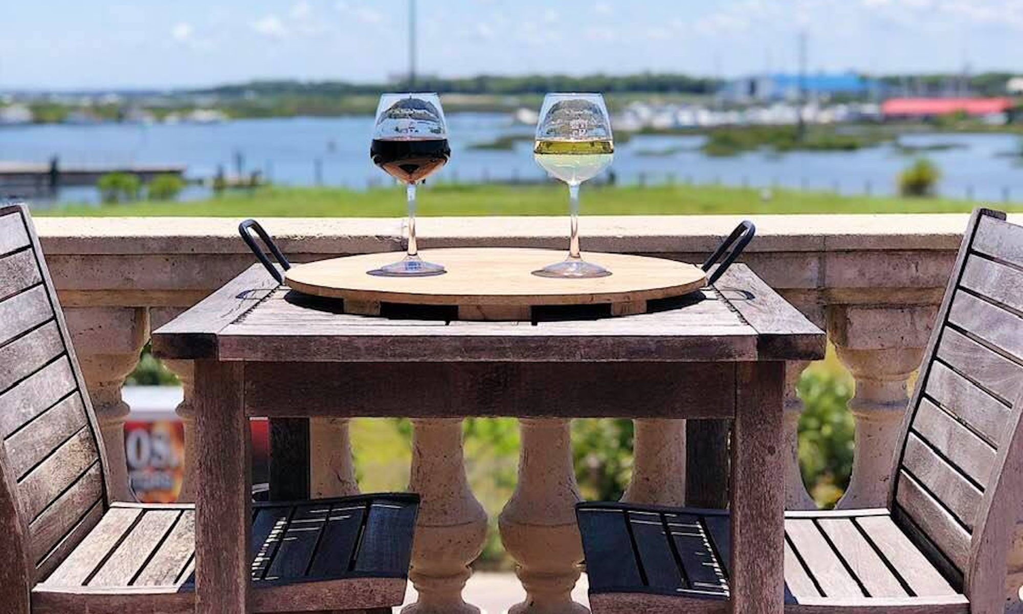 Two glasses of wine on a table on the Cellar's rooftop