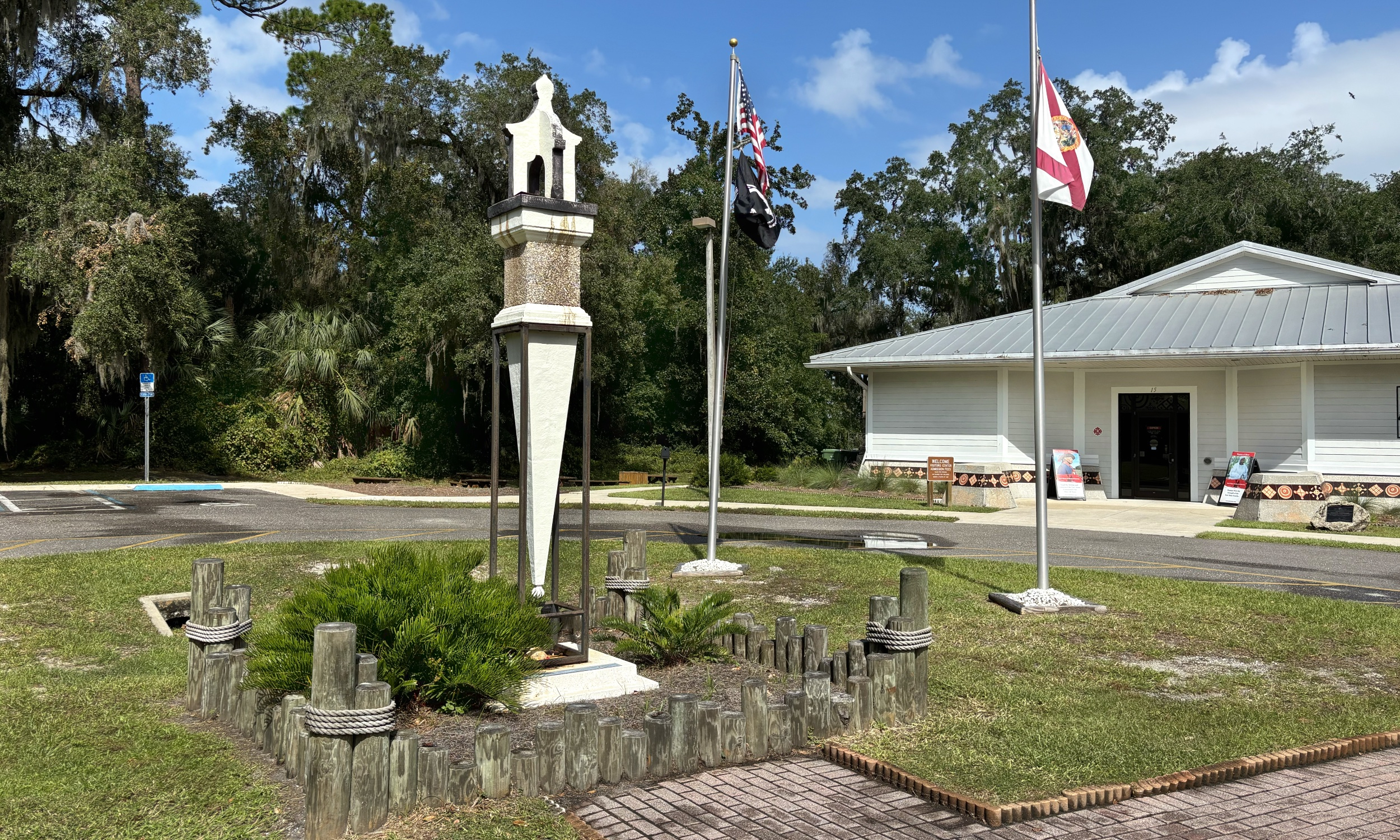 A white pillar statue