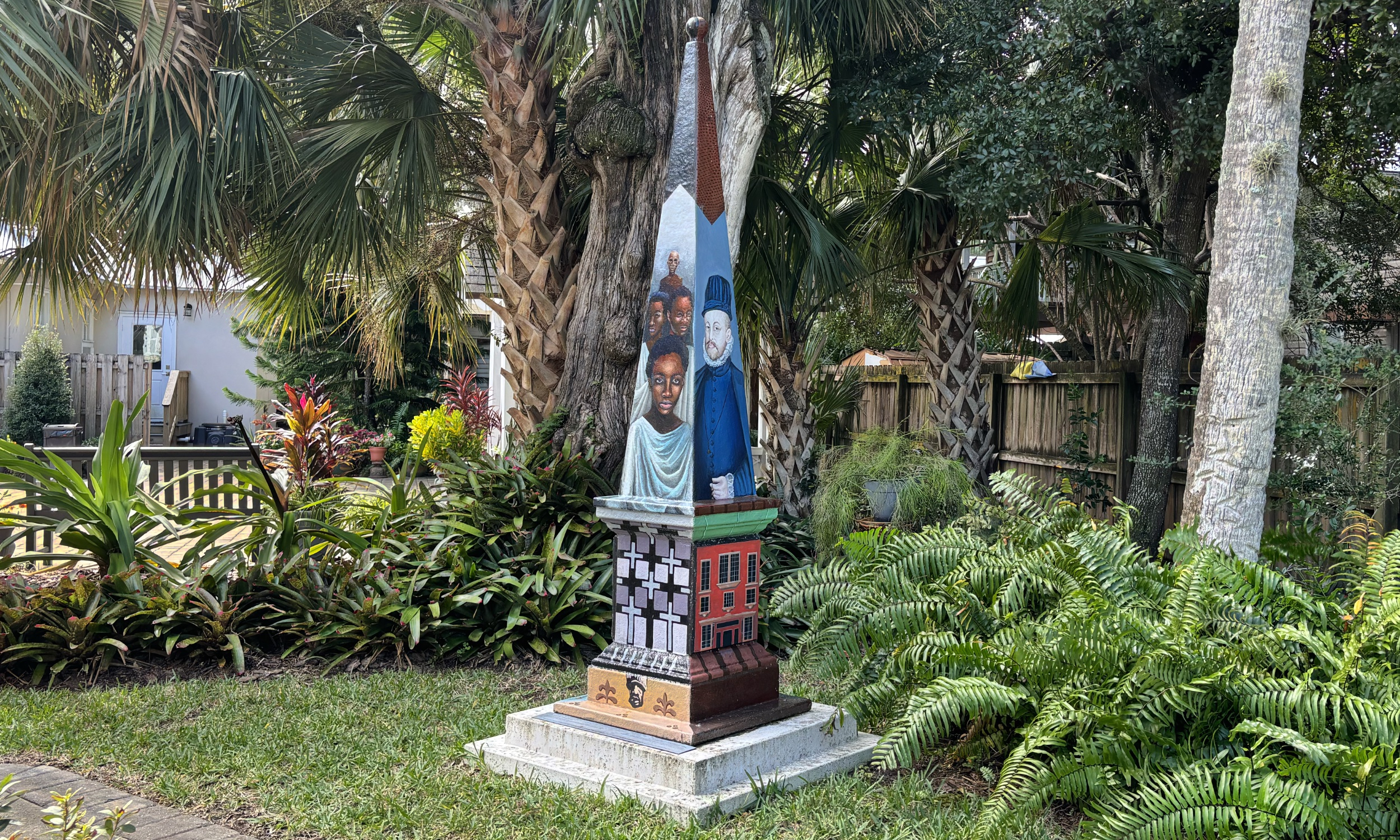 Colorful people on an obelisk