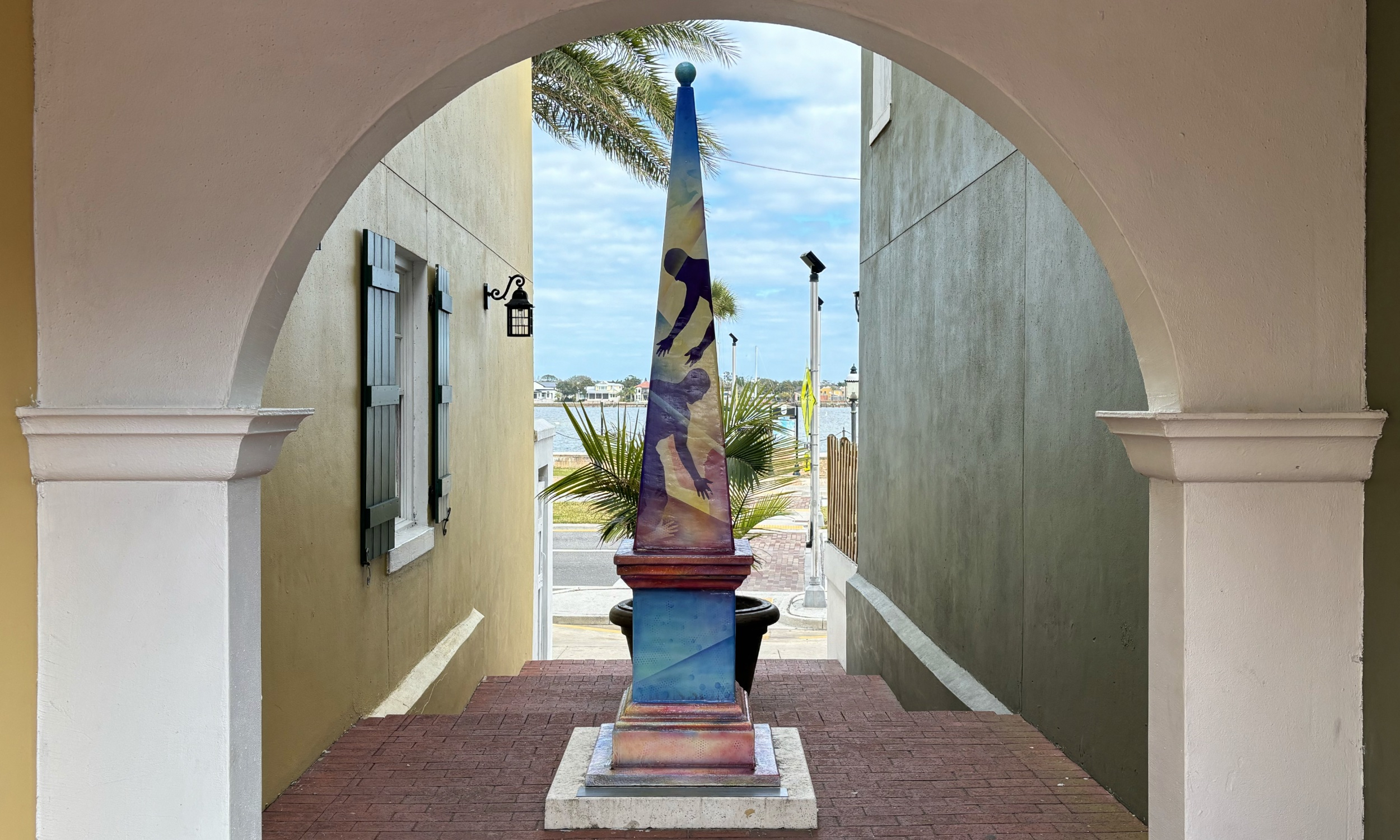 An obelisk on display in a historic walkway