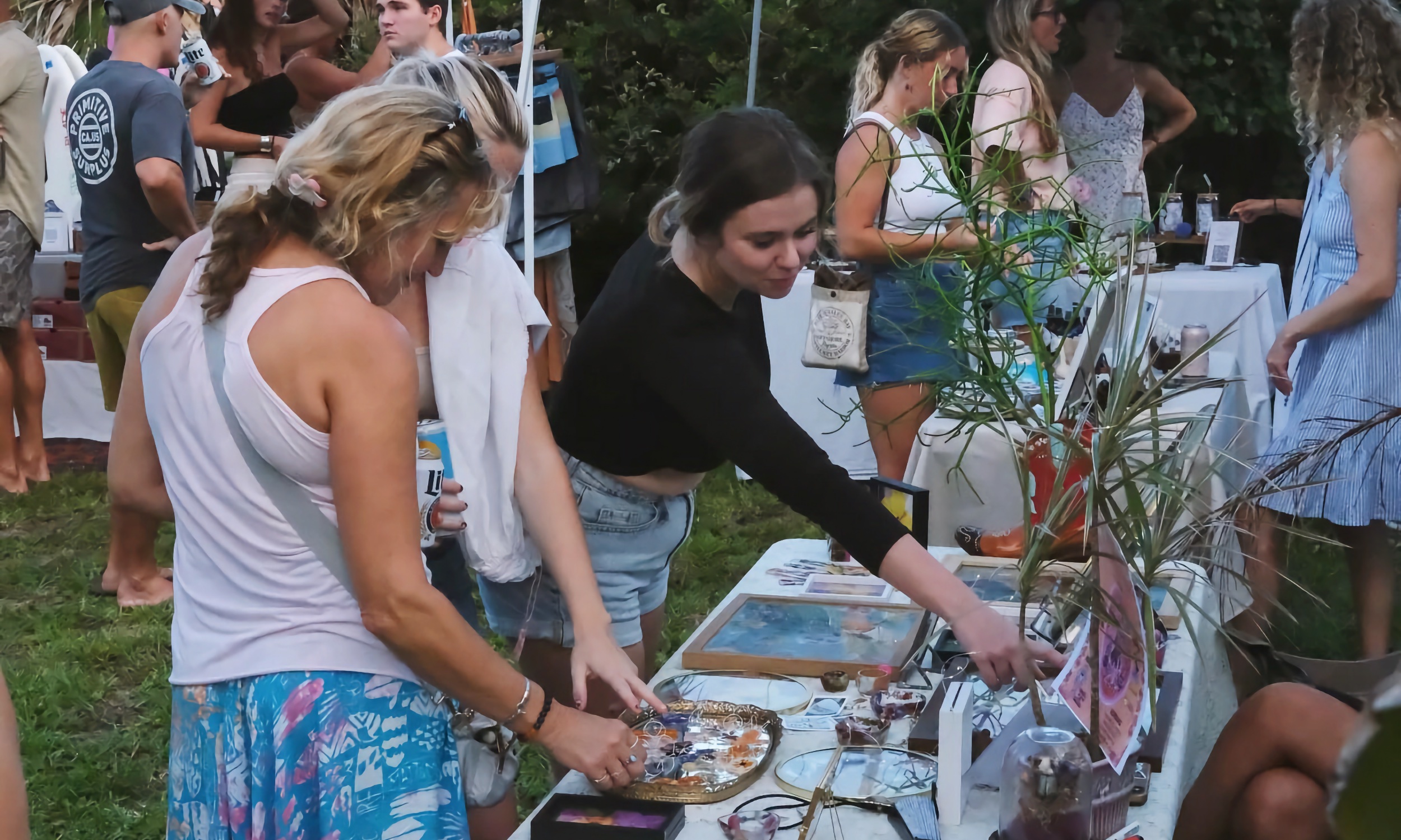 Visitors shopping from local vendors at Surf Stop