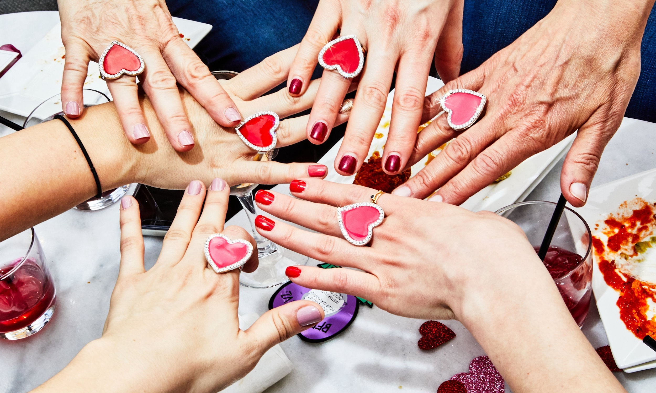 Female hands with Valentine's nails and rings