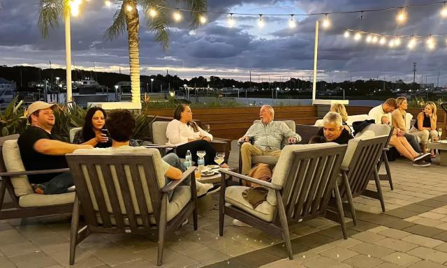 Guests gathering on the deck for an Asador at Asado Life