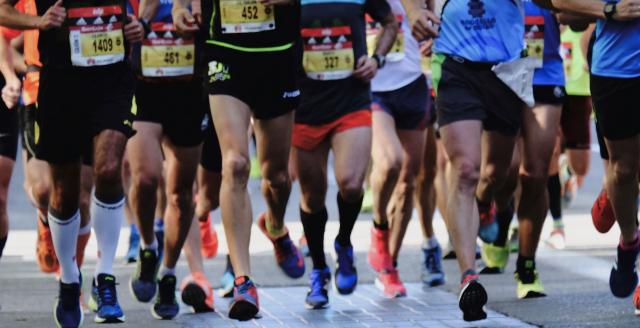 Participants race quickly over asphalt. 