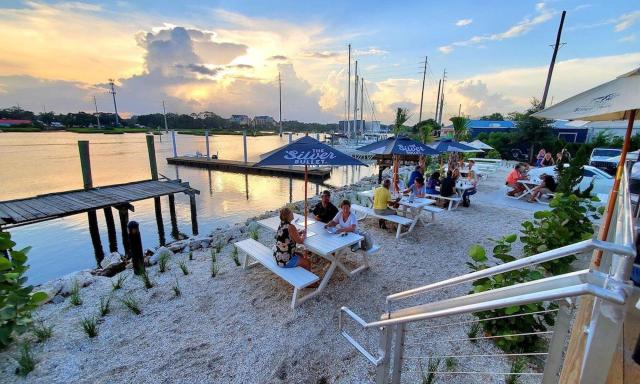 Outdoor seating next to a river