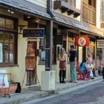 A section of St. Augustine's art district during First Friday Art Walk, with a view of galleries and art enthusiasts