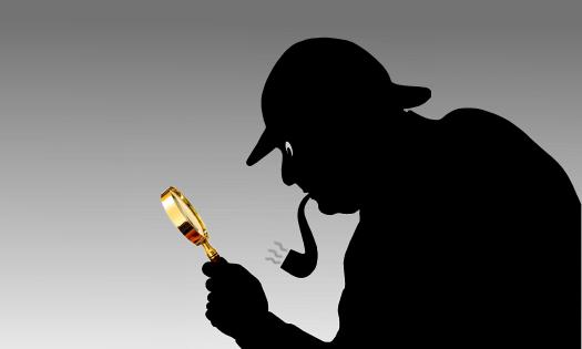 A silluoette of a sleuth wearing a dearstalker hat and smoking a pipe, with a gold magnifying glass in hand