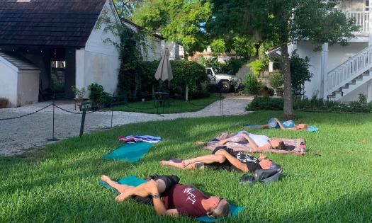 A yoga class in session on the museum's lawn