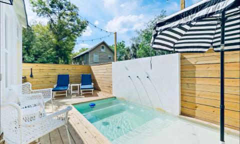 This compact pool and deck are an oasis for two at a vacation rental cottage