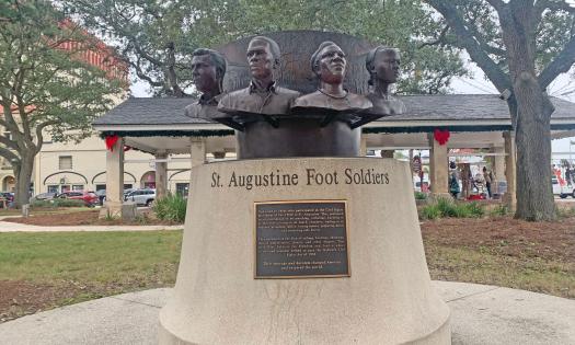 The St. Augustine Foot Soldiers Monument honors the average men and women who stood against oppression during the 1964 Civil Rights Movement in St. Augustine. The monument was the brainchild of Barbara Henry Vickers, and stands in the Plaza de la Constitucion in St. Augustine, Florida..