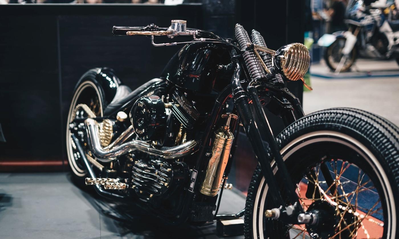 A motorcycle is situated next to a stage. 