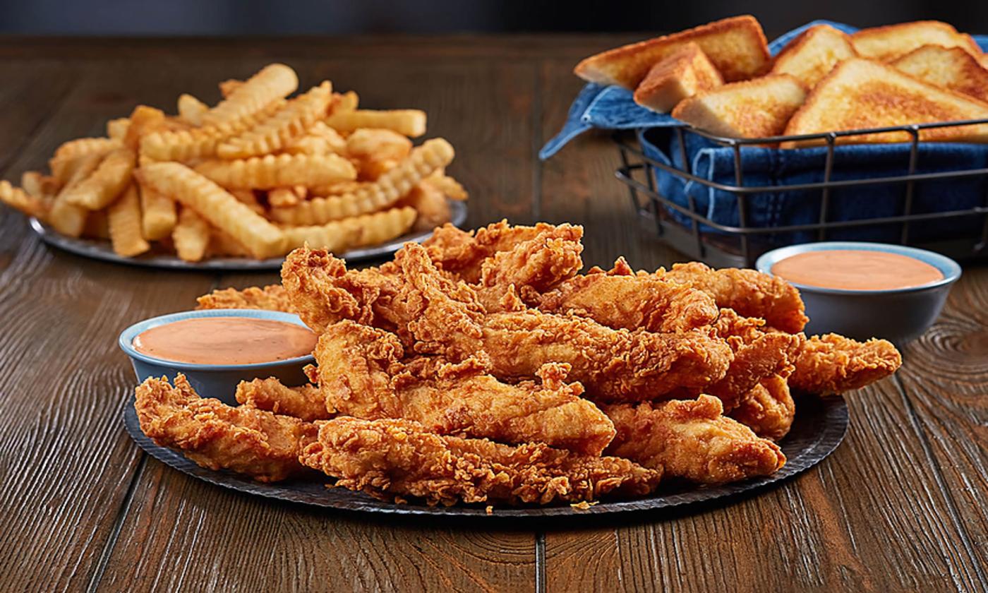 Zaxby's chicken with French fries, Texas toast, and Zaxby's signature dipping sauce