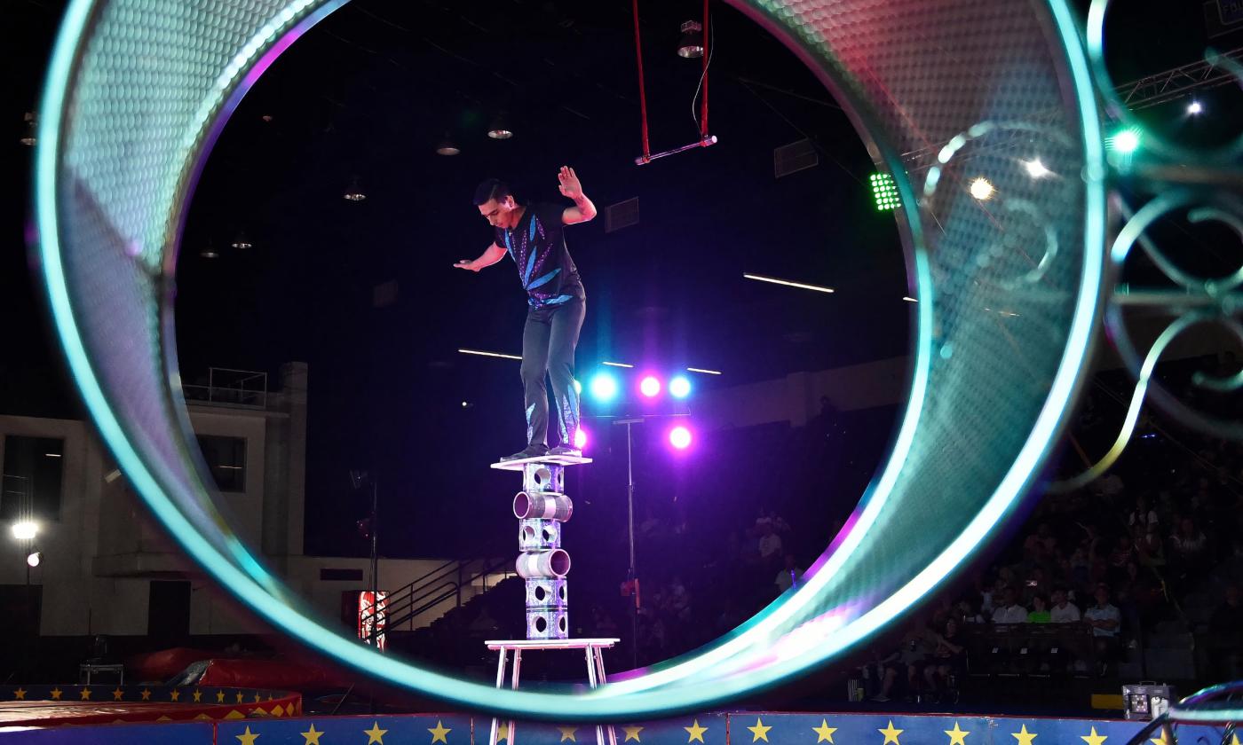 An acrobat performing at the Loomis Bros. Circus