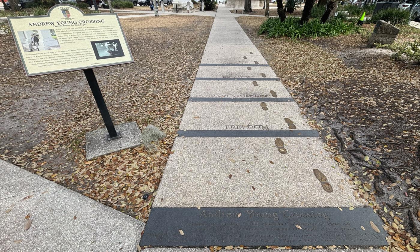 This monument, made granite, bronze, and coquina, stretches over 25 ft of sidewalk in the Plaza de la Constitución.