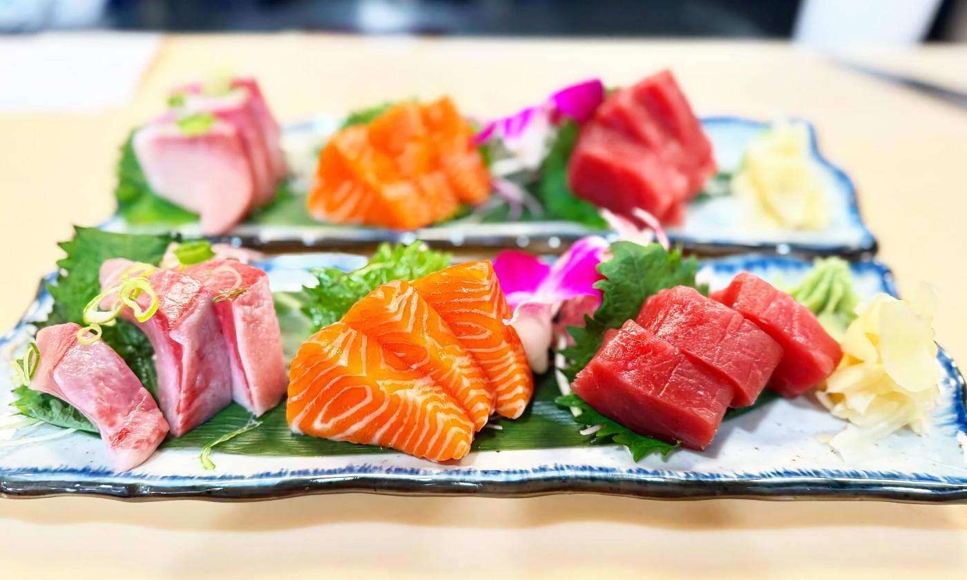 Fresh seafood and garnishes arranged on a plate