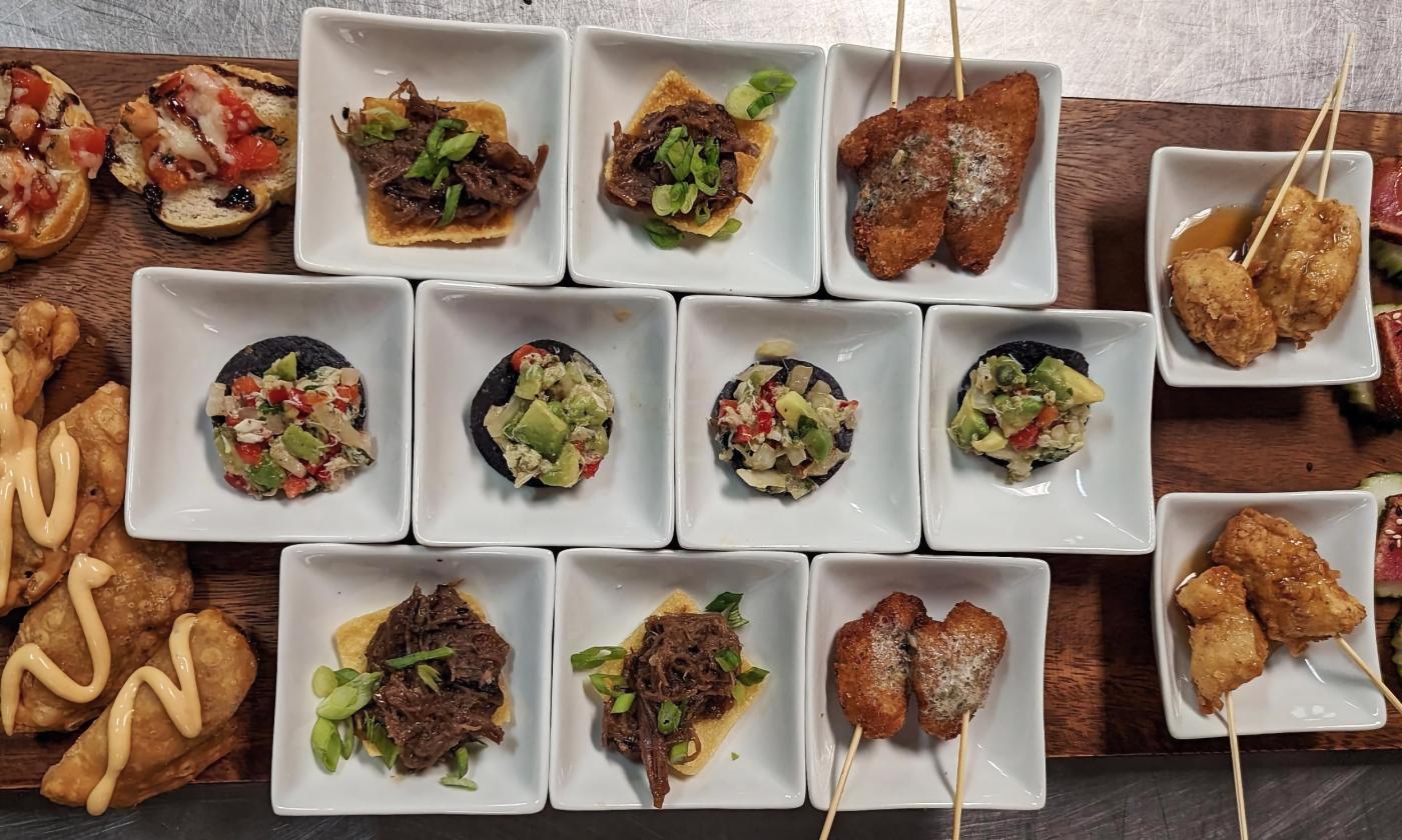 Various plates of food presented for guests