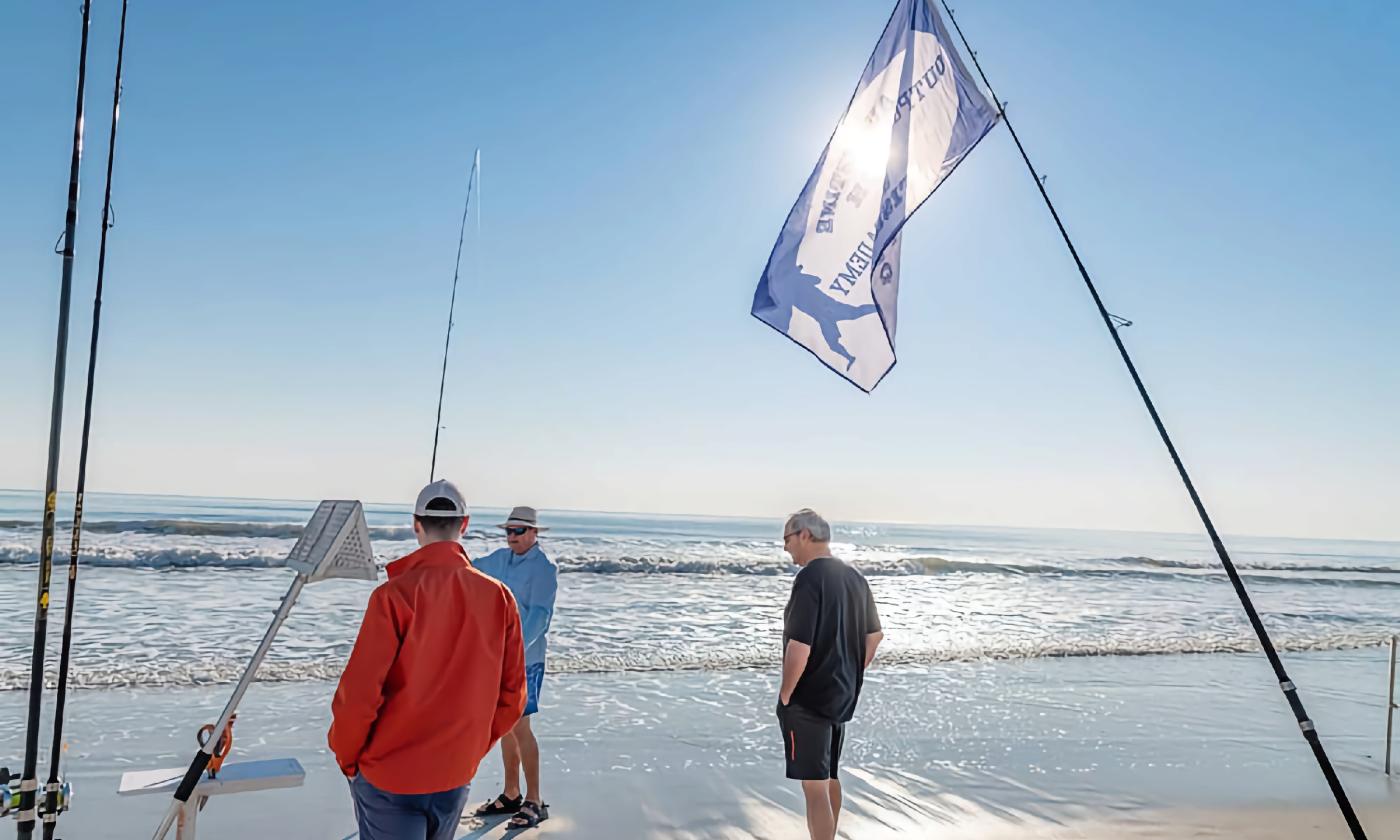 Fishermen learning surf fishing on the beach in St. Augustine