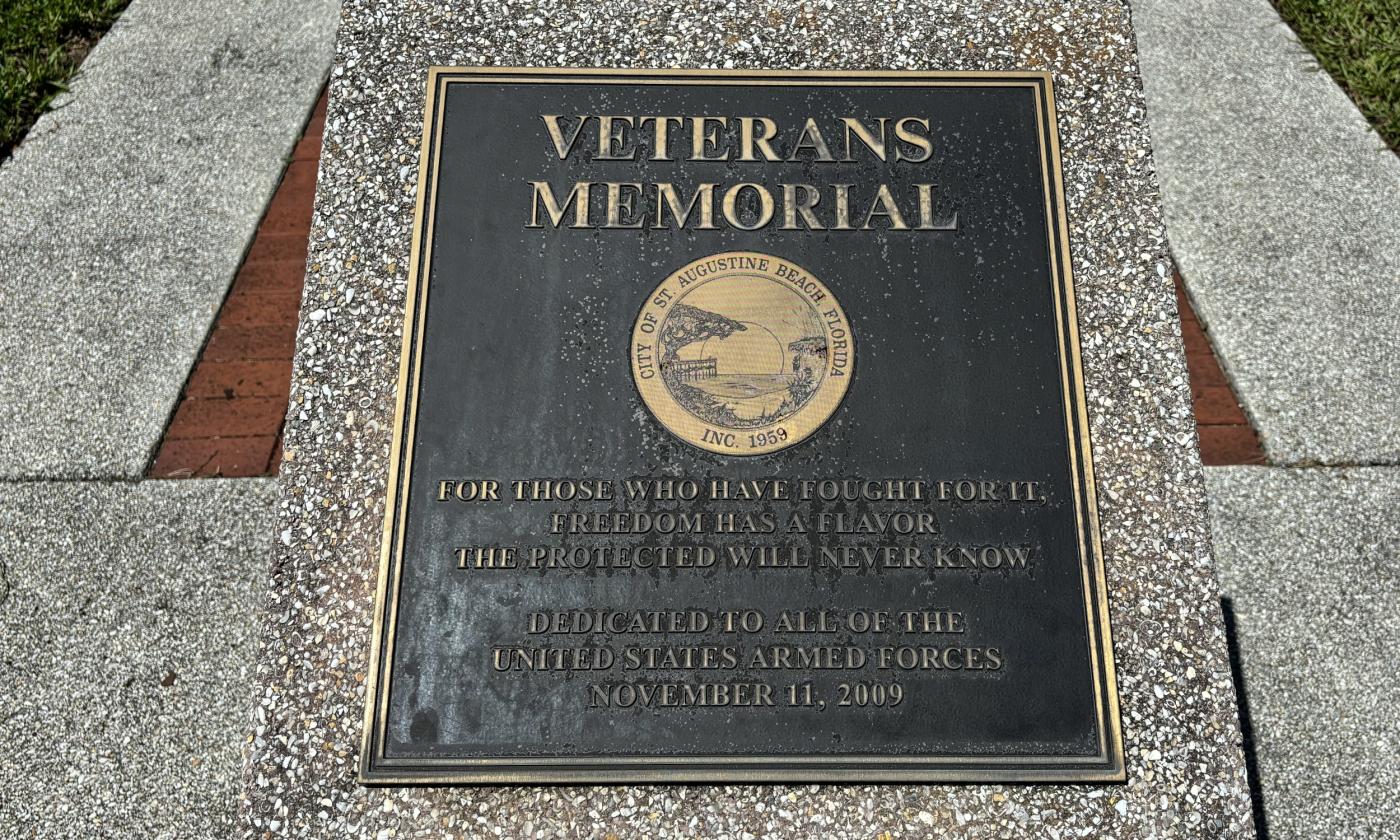 The memorial plaque at the foot of the Veterans memorial in Lakeside Park