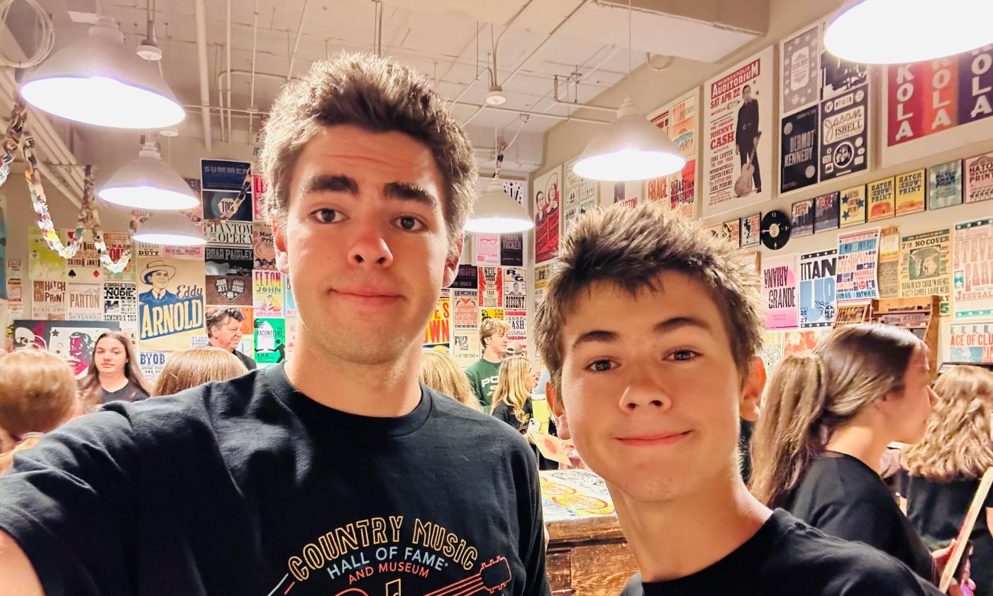 Brothers and two-man band, Holt and Cabe standing in a record store