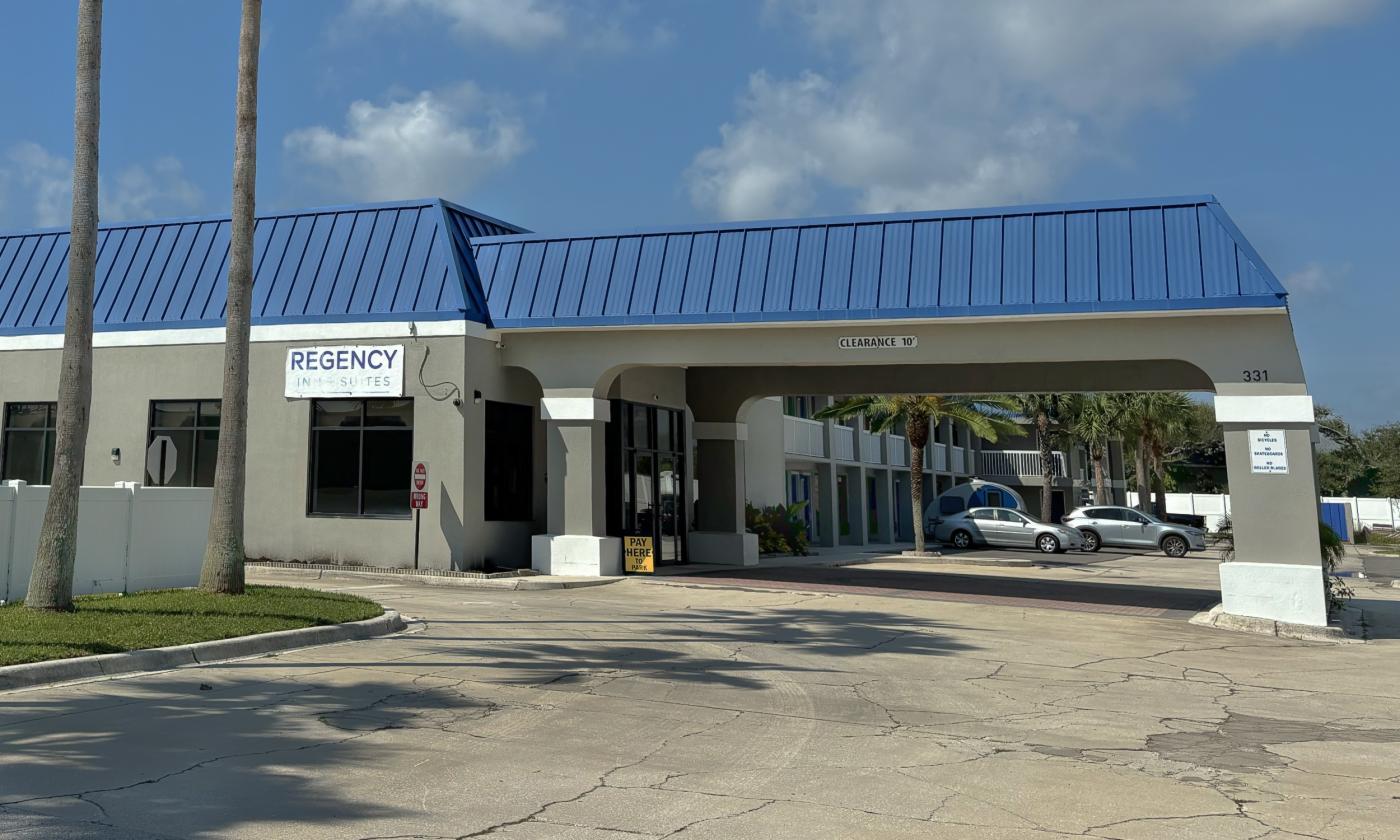 The entrance to Regency Inn on St. Augustine Beach, includes a large car port