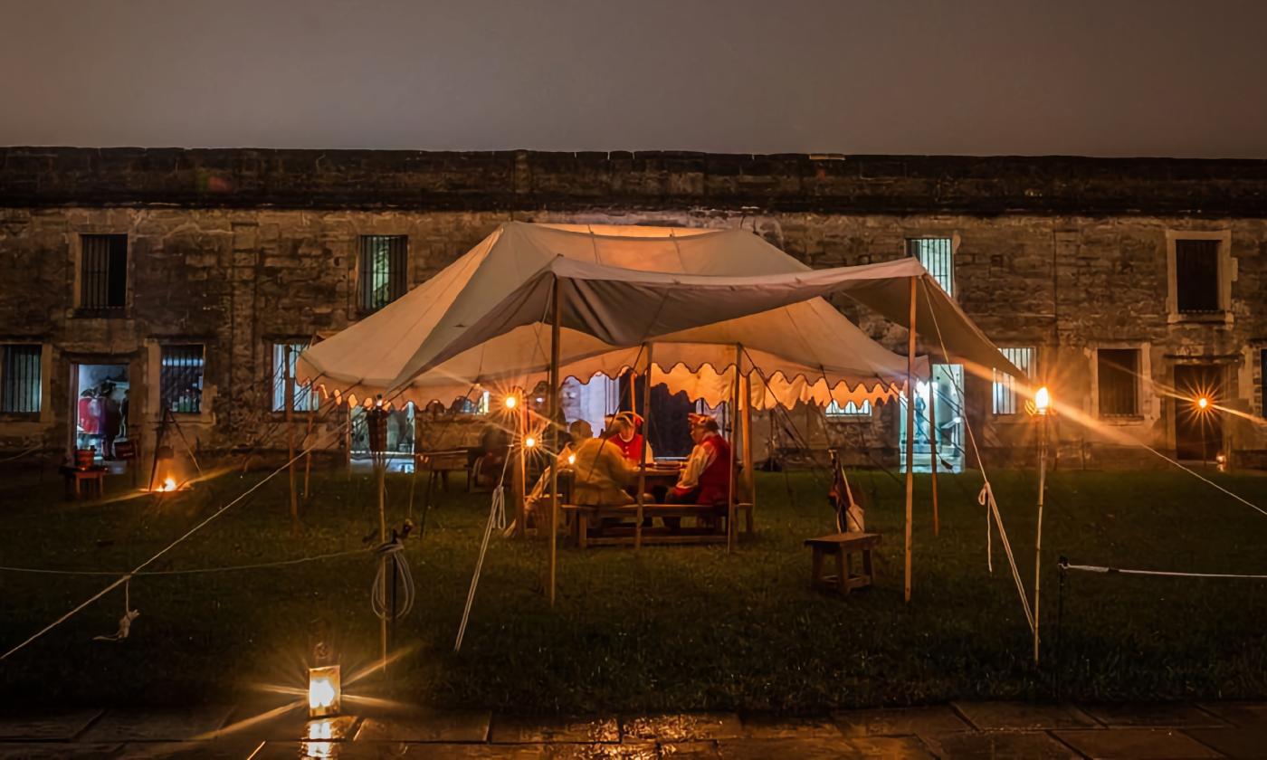 The Castillo de San Marcos under candlelight for a reenactment of the siege of 1740