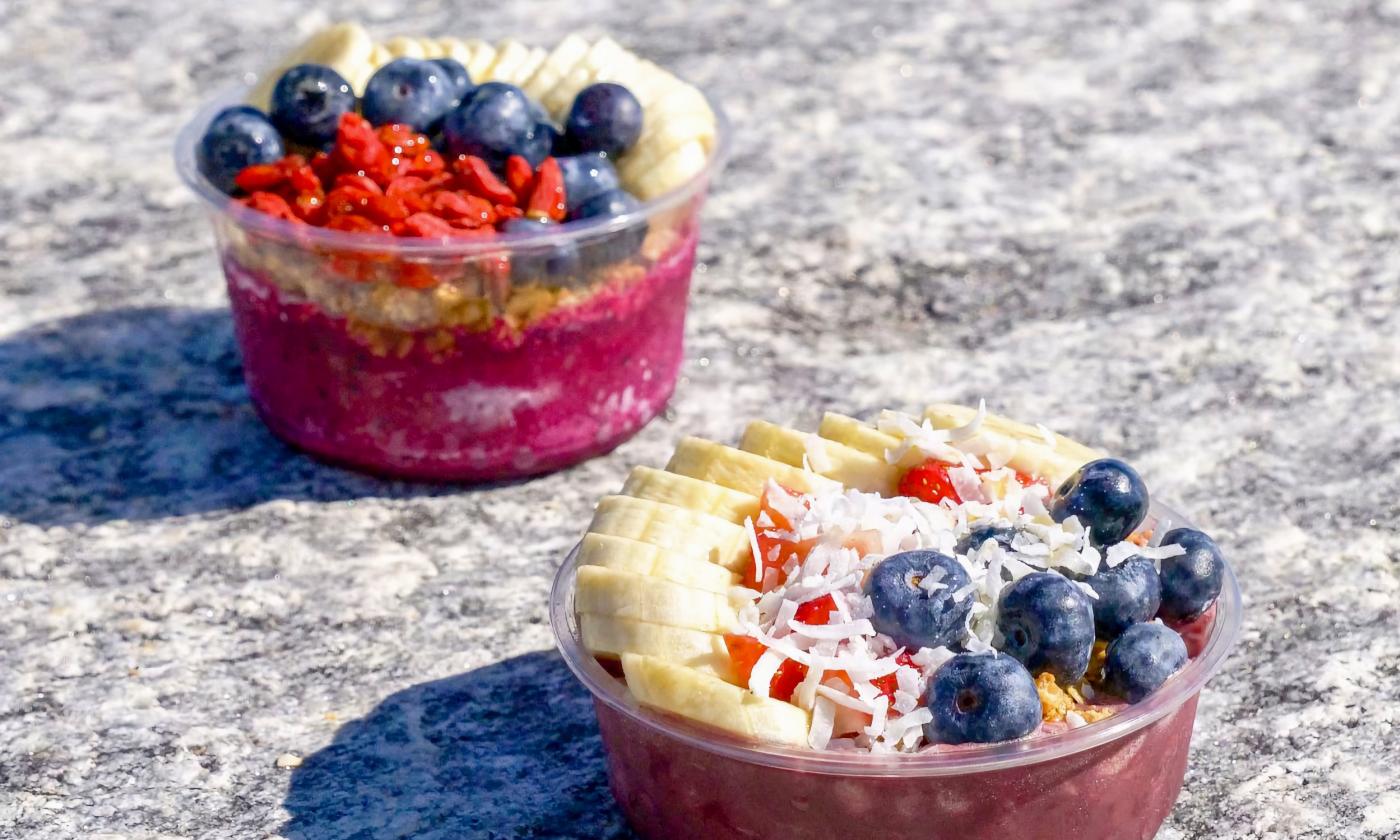 Açaí bowls served with fruit toppings