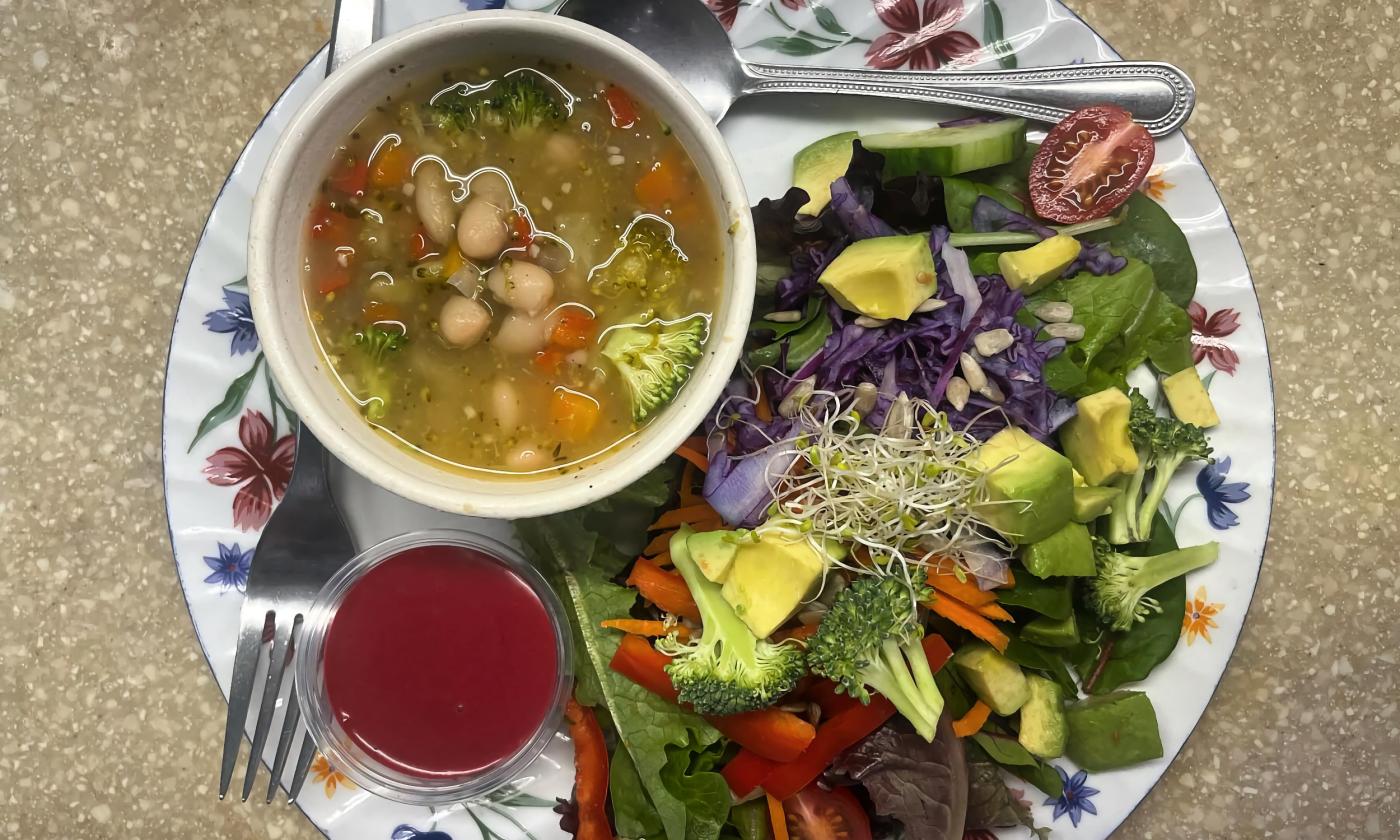 Salad and a bowl of soup served at the eatery