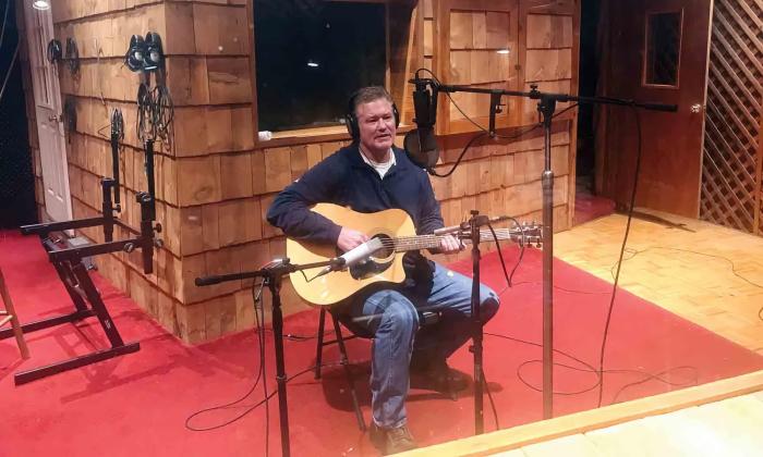 Arlos Smith recording his song "This Ole Guitar" in a music studio in Wood County West Virginia