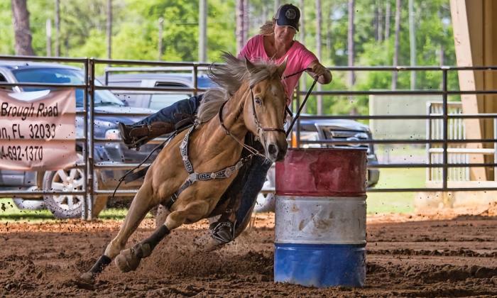 A woman riding a horse at the Cracker Day Celebration at Elton, FL