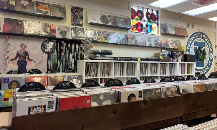 Records line the shelves and walls inside the shop