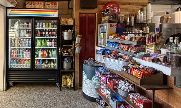 Drinks and quick bites presented inside the Snack Shack