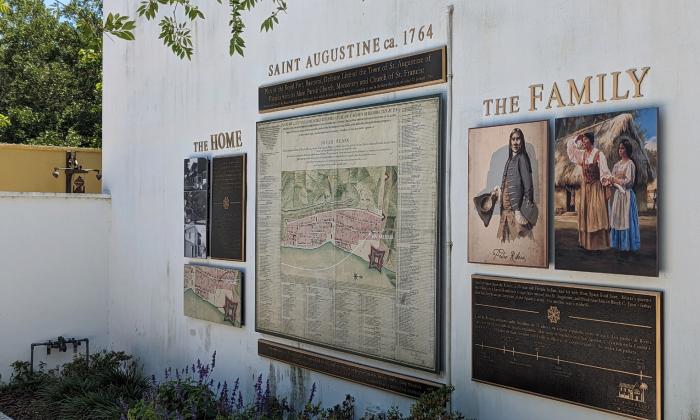 The Ribera Garden has several informational plaques and a map on the walls of the house