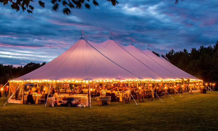 A large tent set up for a night event