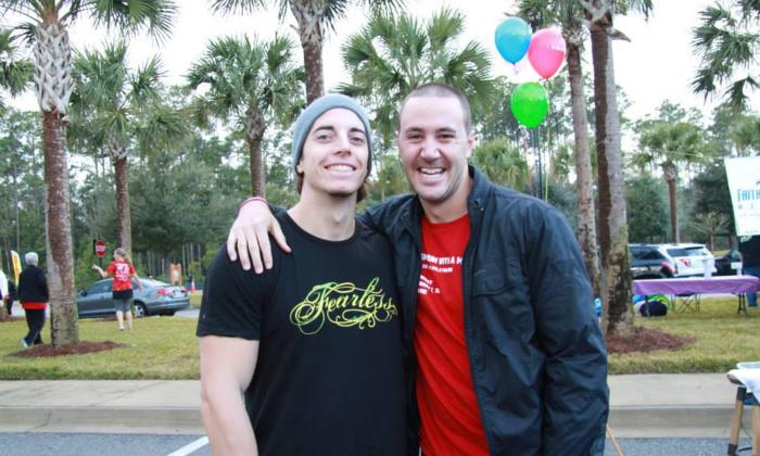 Two participants gathered on race day at Faithful Servant Mission's Run With a Mission race