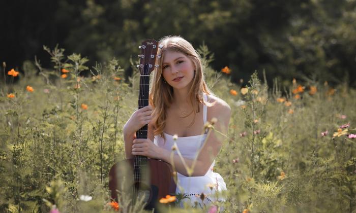 Judy Anne Jackson in a field of flowers