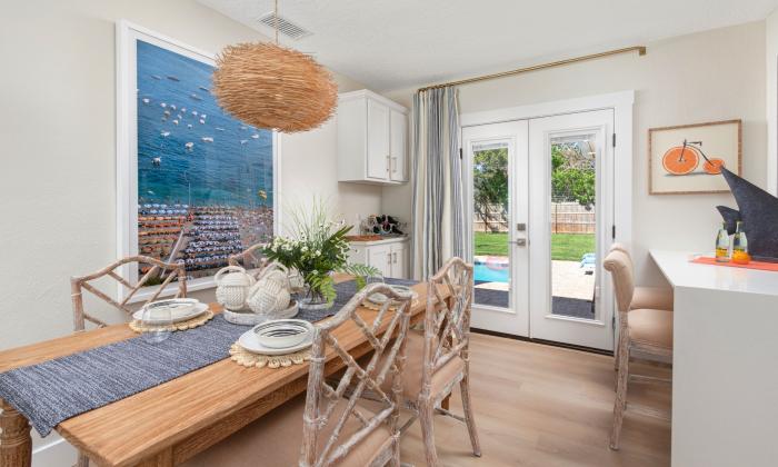 This dining area in a rental home has seating at table and at a counter