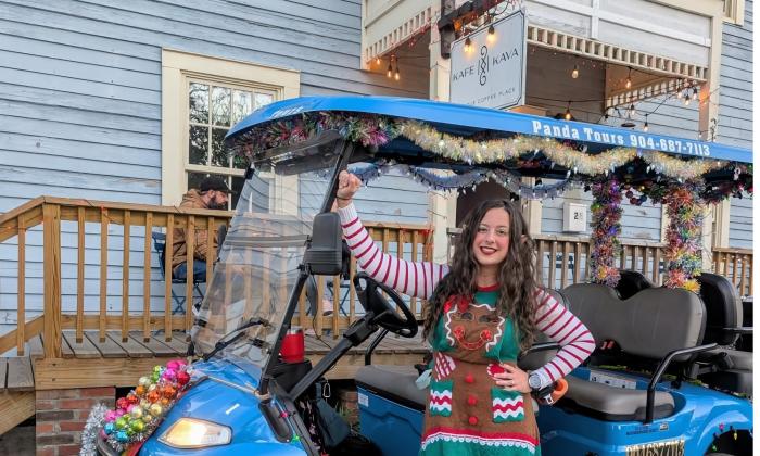 An "elf" driver ready for Nights of Lights tour passengers in St. Augustine
