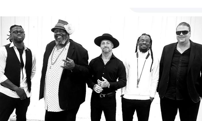 black and white image of The band Chillula standing together