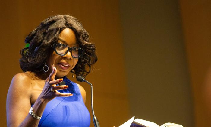 Dr. Edda Fields-Black on stage discussing her recent book