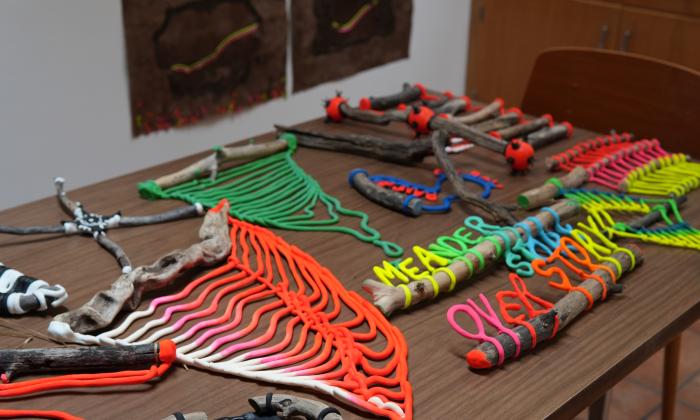 Nicole Antebi's work spread out on a table