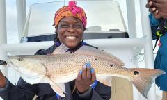 A fisherlady and her catch of the day