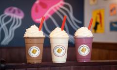 A variety of milkshakes in a line