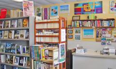 Book shelves fill the inside of the store