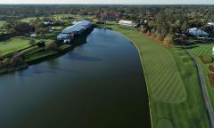 The clubhouse and audience stands on the 18th hole at The Players Stadium Course