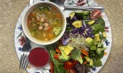 Salad and a bowl of soup served at the eatery