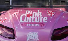 A Pink Culture golf cart