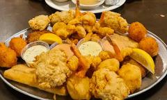 The Captain's Platter At Schooner Seafood House is full of fried seafood for two