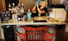 A bartender prepares a drink for Toast With Cocktails in St. Augustine, FL.